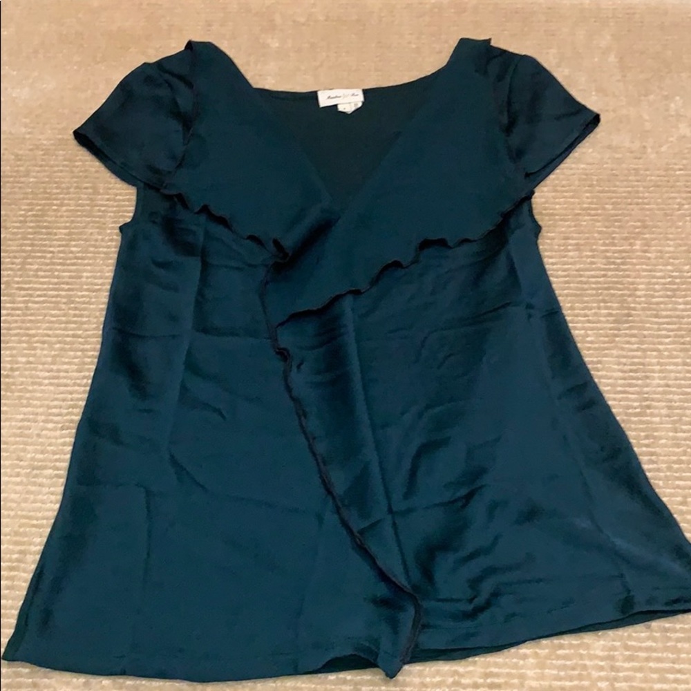 Emerald green capsleeved blouse from Anthropologie